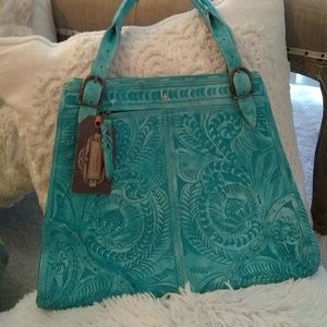 NEW Authentic leather carved bag